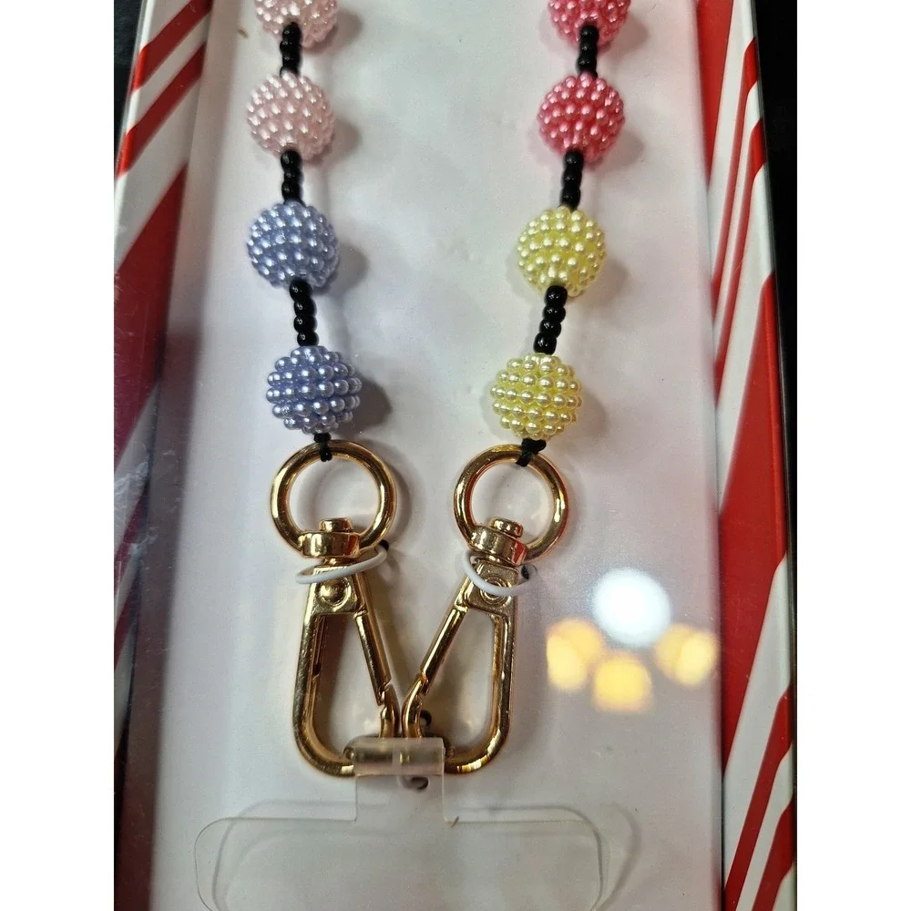 A New Day beaded crossbody strap and 3 beaded phone wristlets (gone tone clasps)